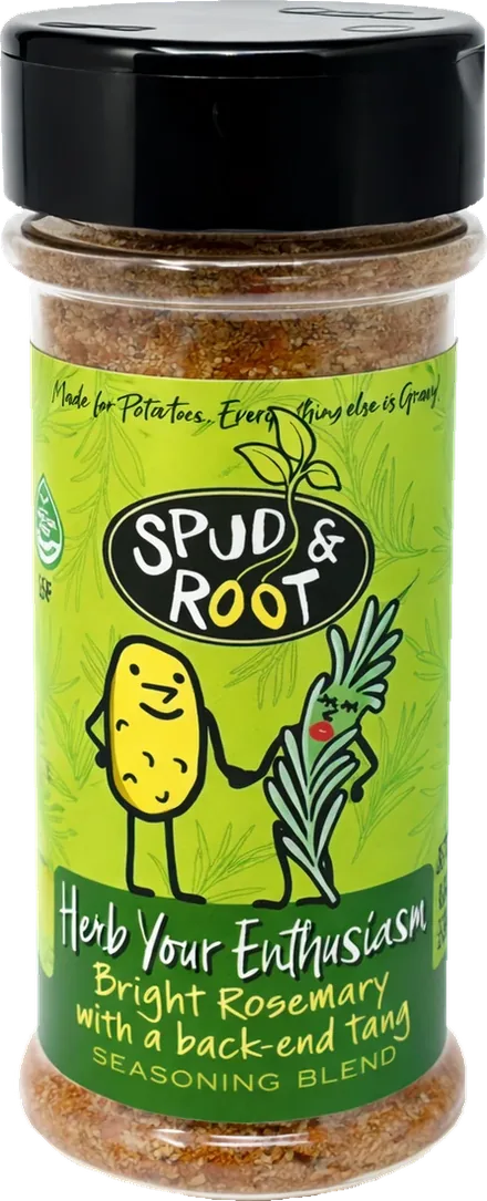 Herb Your Enthusiasm shaker jar with a black cap. The green label shows the Spud & Root logo and a cartoon potato holding hands with a rosemary sprig.